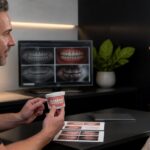 Dentist assessing whether a patient is a good candidate for a Hollywood Smile