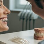 Dentist assessing a patient’s natural smile width before deciding how many E-max veneers may be appropriate