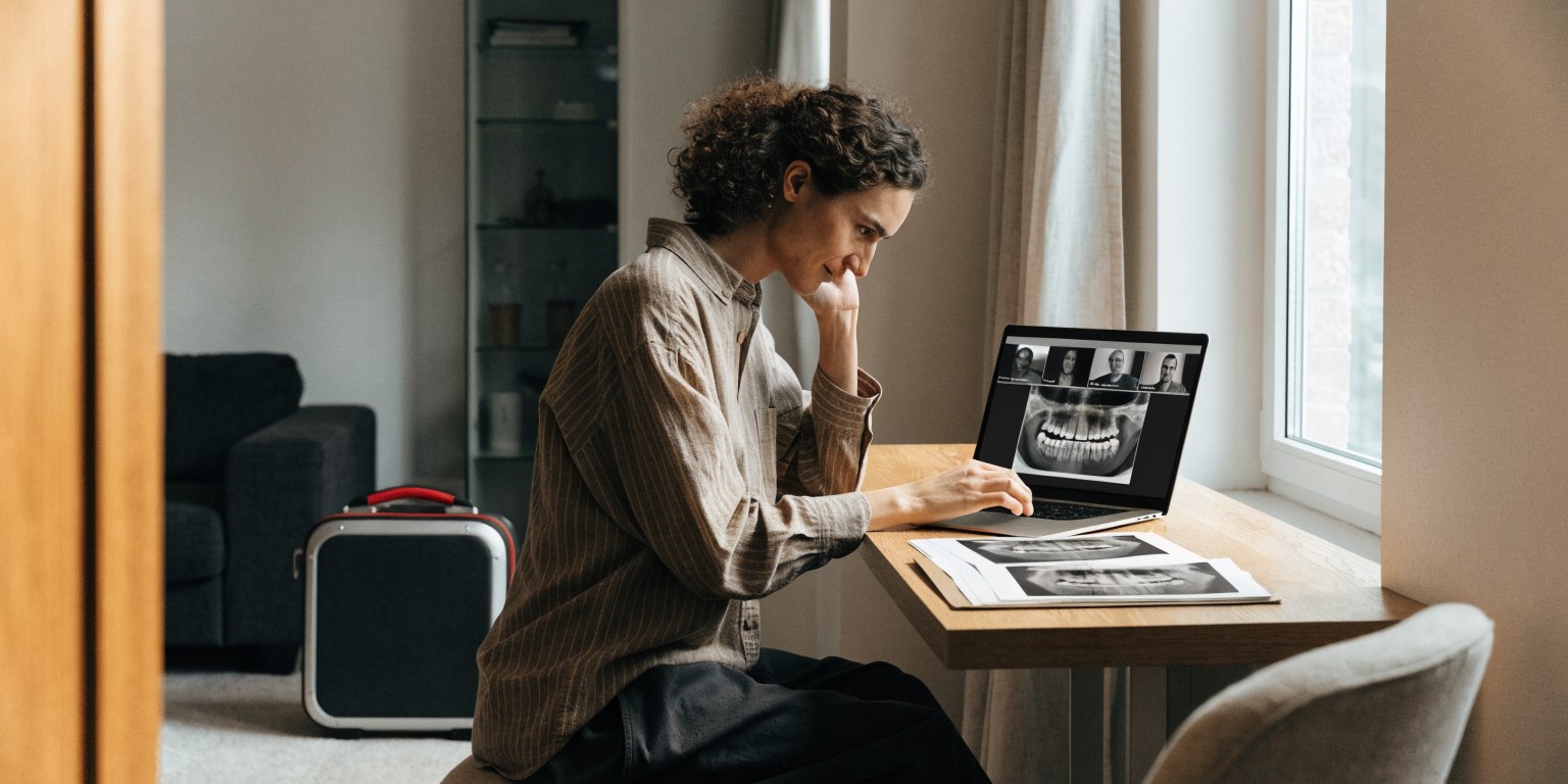 International dental patient preparing scan files and treatment records for an implant consultation