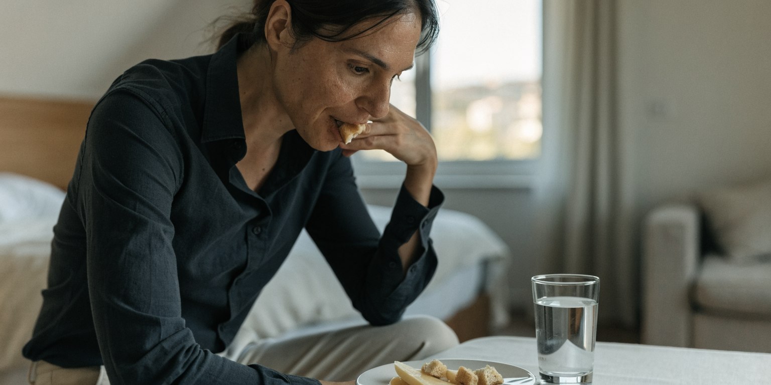 Patient resting comfortably after a single dental implant procedure