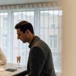 A patient and dentist discuss veneer materials and a treatment estimate