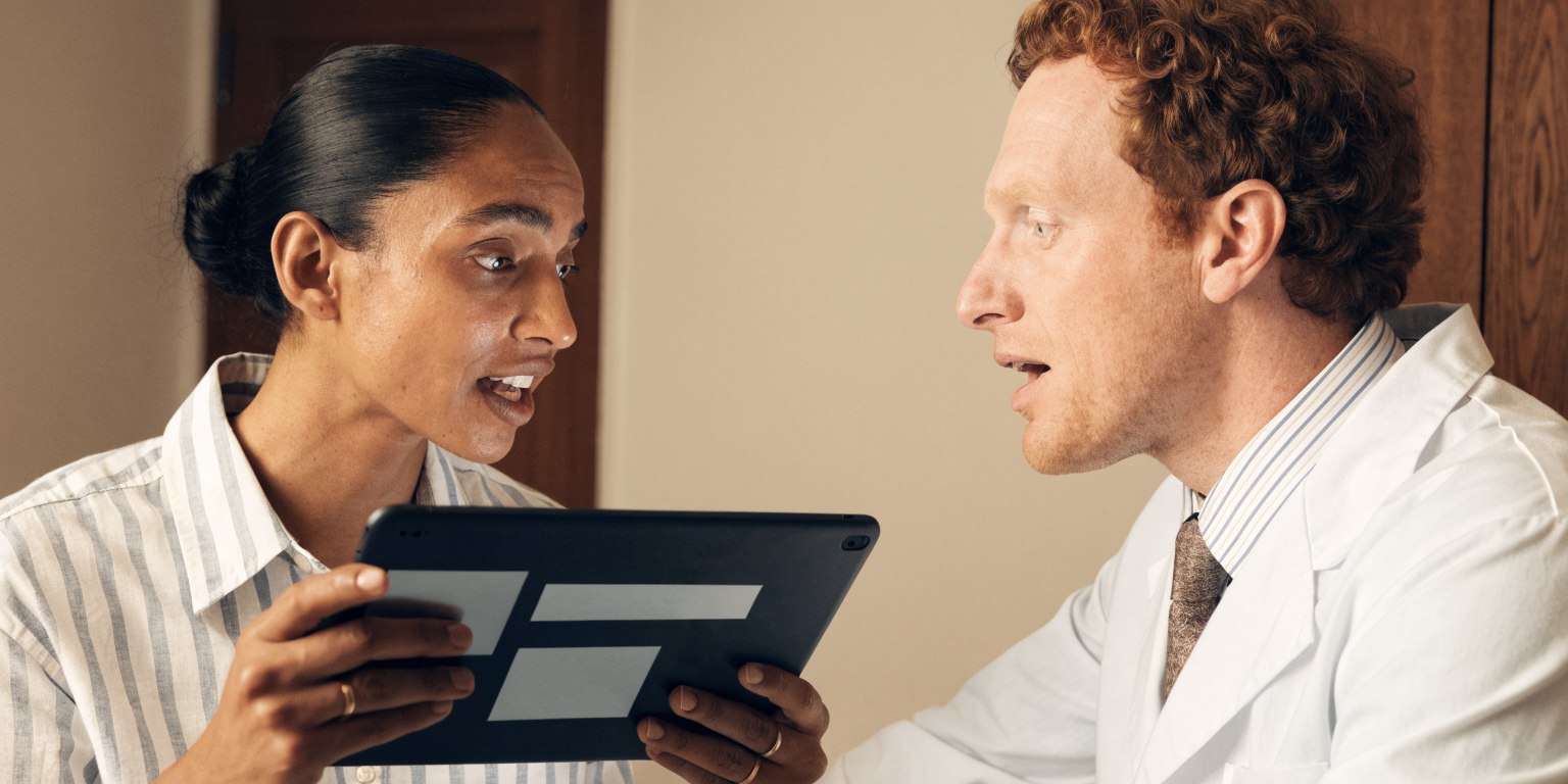Patient verifying dentist identity and qualifications before dental treatment in Turkey